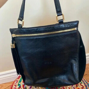 Margot black leather suede tassel gold hardware bag